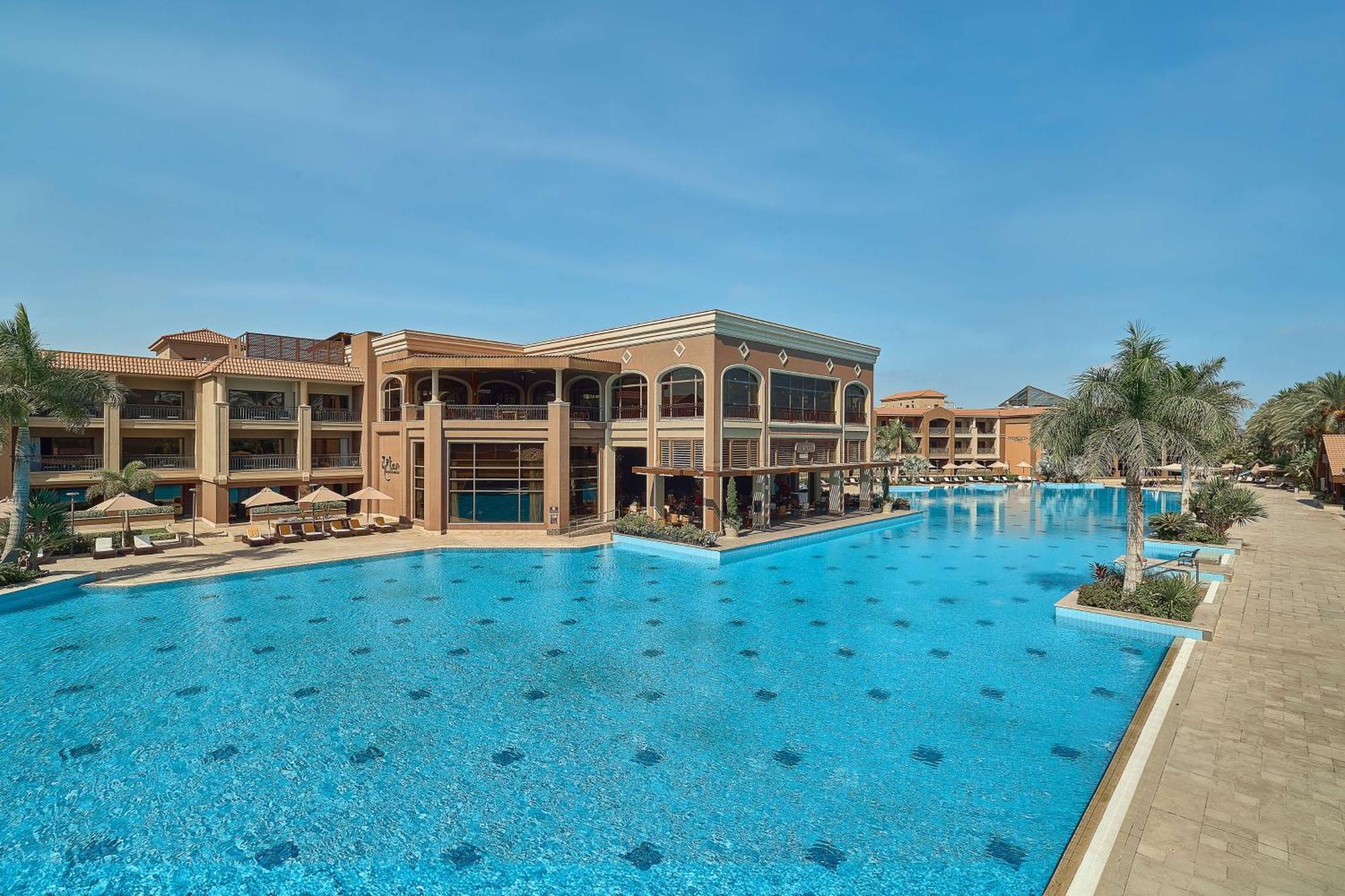 Hilton Alexandria King'S Ranch Hotel King Mariout Exterior photo The swimming pool at the resort